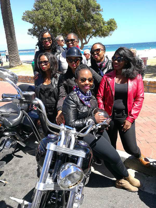Harley Davidson Tours African Ladies Sitting On Touring Harleys