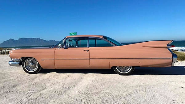 Pink Cadillac With Table Mountain In Background