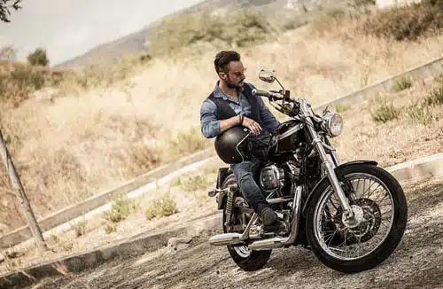 harley davidson rentals man sitting on black bike