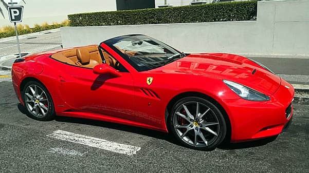 sports cars chauffeur trips red ferrari california convertible