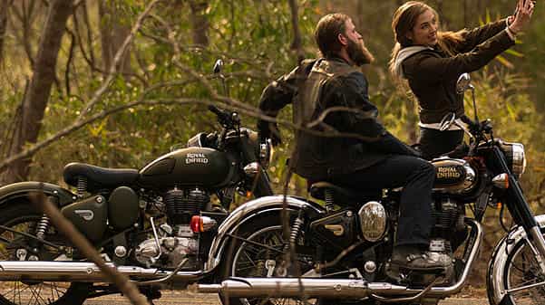 cape corporate tours royal enfield motorcycle rentals couple on two enfield motorcycles taking photo